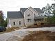 9-30  Siding done and leachfield installed and covered with stone